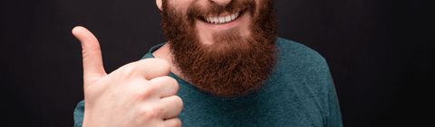 Thumbs up from bearded man