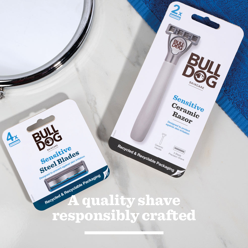 The Bulldog Skincare Sensitive Ceramic Razor in packaging sits on a white surface next to the Sensitive Steel Blades refill pack. Below them, text reads, “A quality shave responsibly crafted.”.