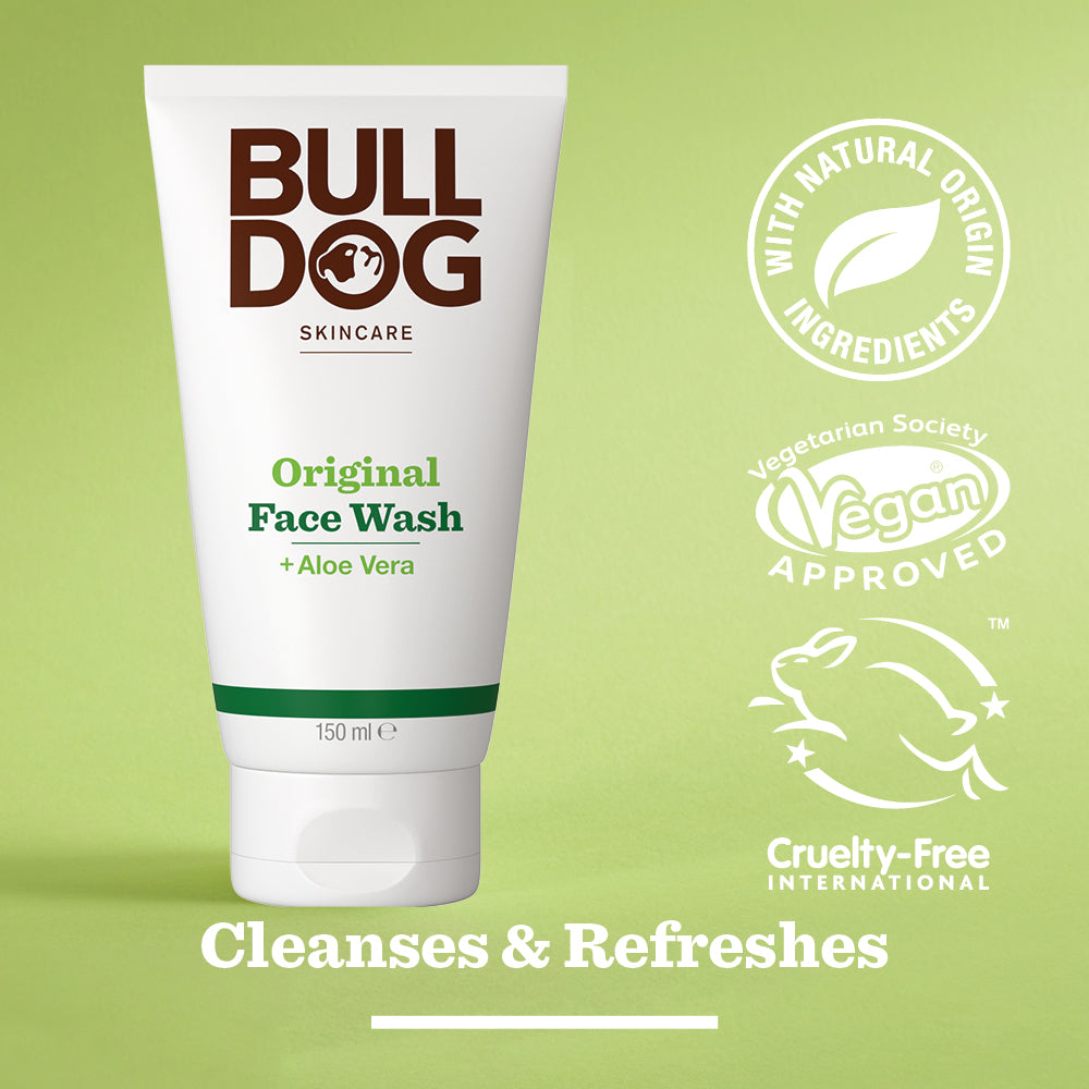 A tube of Original Face Wash for men with Aloe Vera stands on a green background. Vegan, cruelty-free, and natural origin ingredients logos are displayed. Text reads: Cleanses & Refreshes.