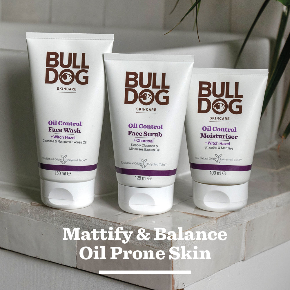 Bulldog Skincare’s Oil Control Moisturiser for men, made with natural origin ingredients, is displayed on a bathroom counter. Text below reads: “Mattify & Balance Oil Prone Skin.”.