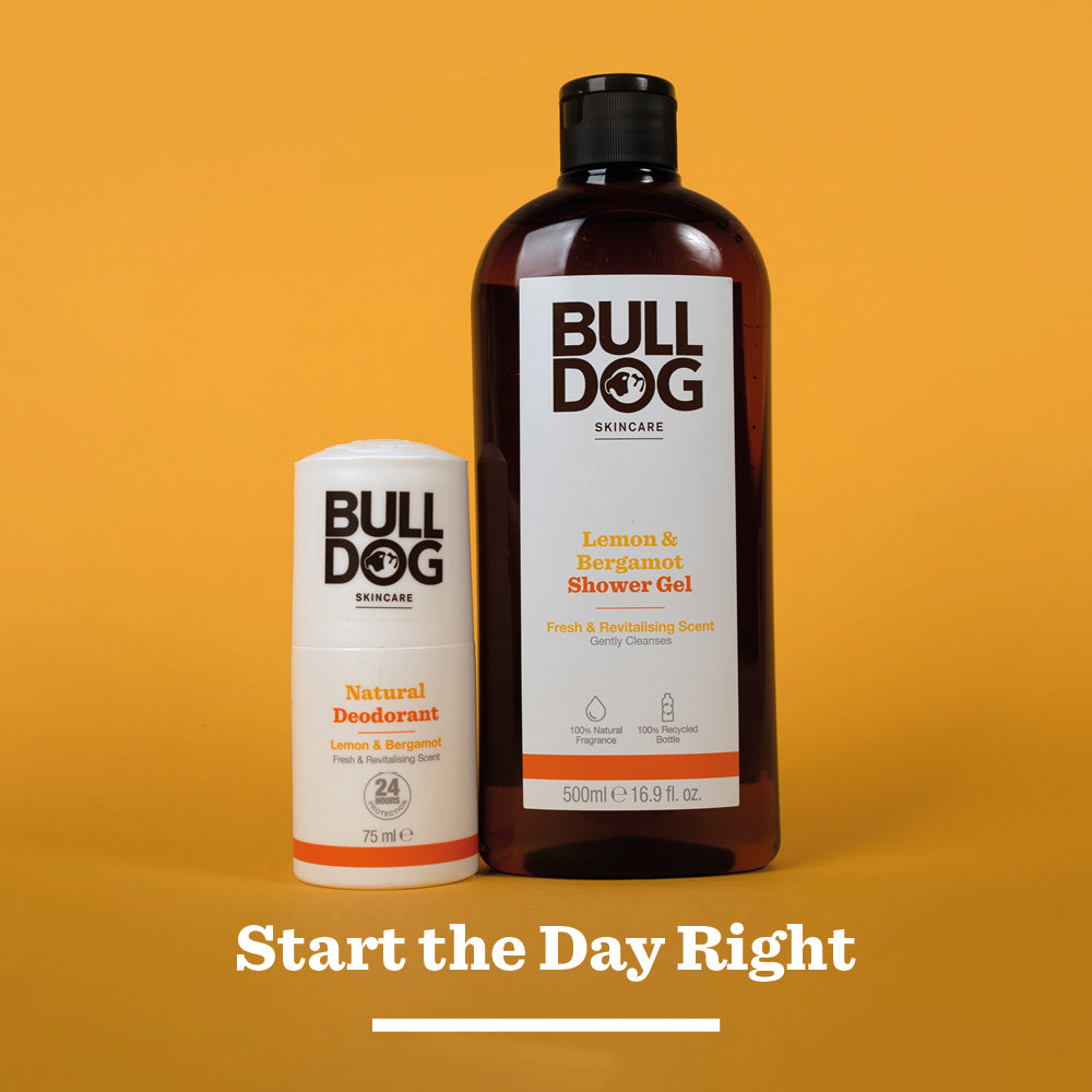 The Lemon & Bergamot Shower Gel (500ml) stands on an orange background, highlighting men’s skincare with a natural fragrance. The phrase Start the Day Right appears below.