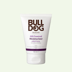 A 100 ml tube of Oil Control Moisturiser for men, formulated for oily skin with natural origin ingredients and witch hazel, in white packaging with dark brown and purple text.